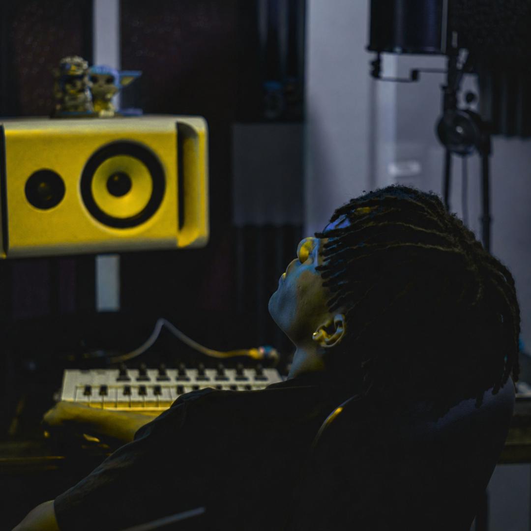 Artist in studio creating music